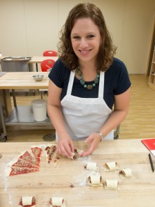 Rolling up our jammed up rugelach. We, unfortunately, rolled them up the wrong (i.e. opposite) way, but they still tasted the same!
